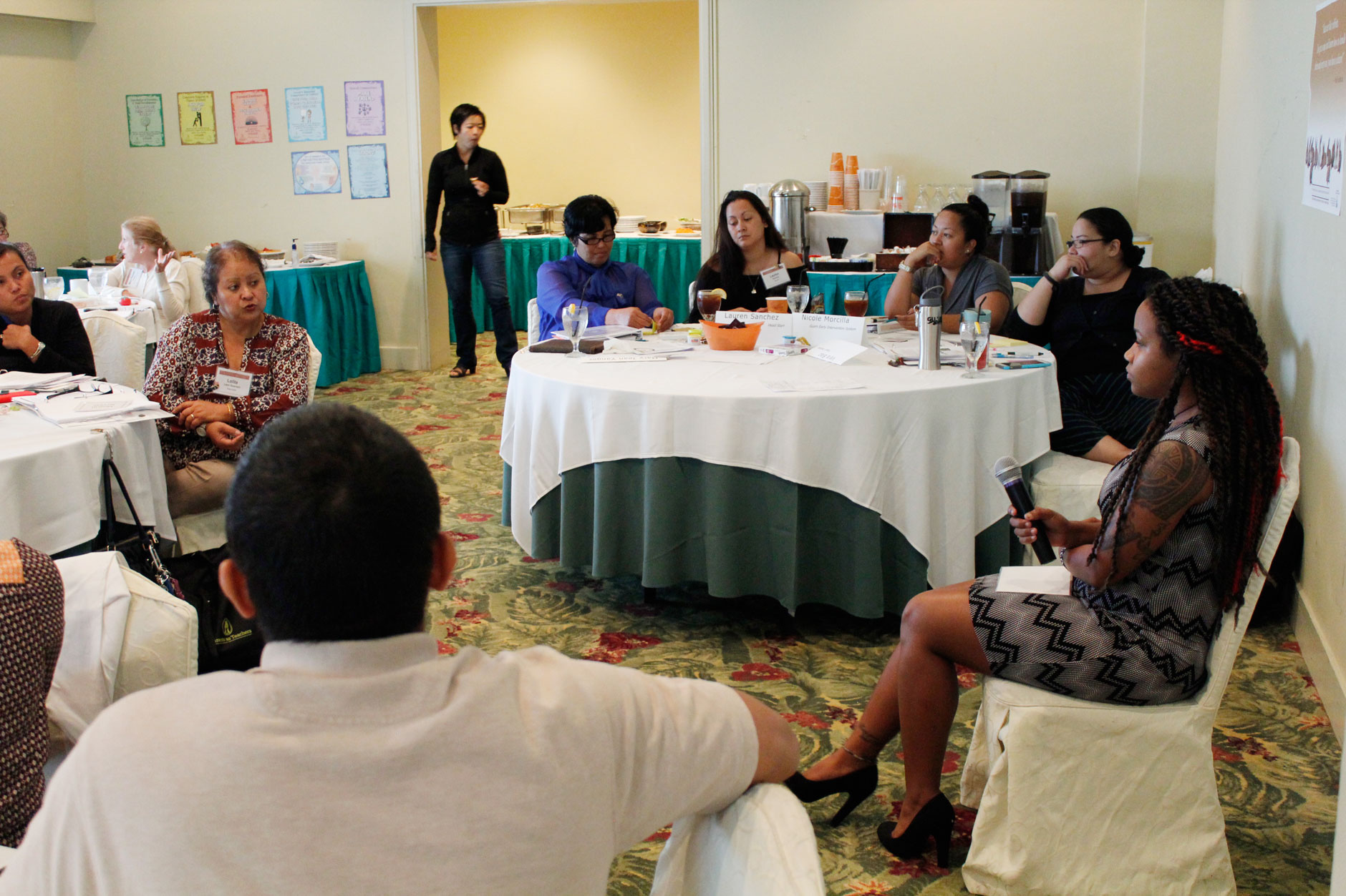 Photo of training participants engaging in a discussion.
