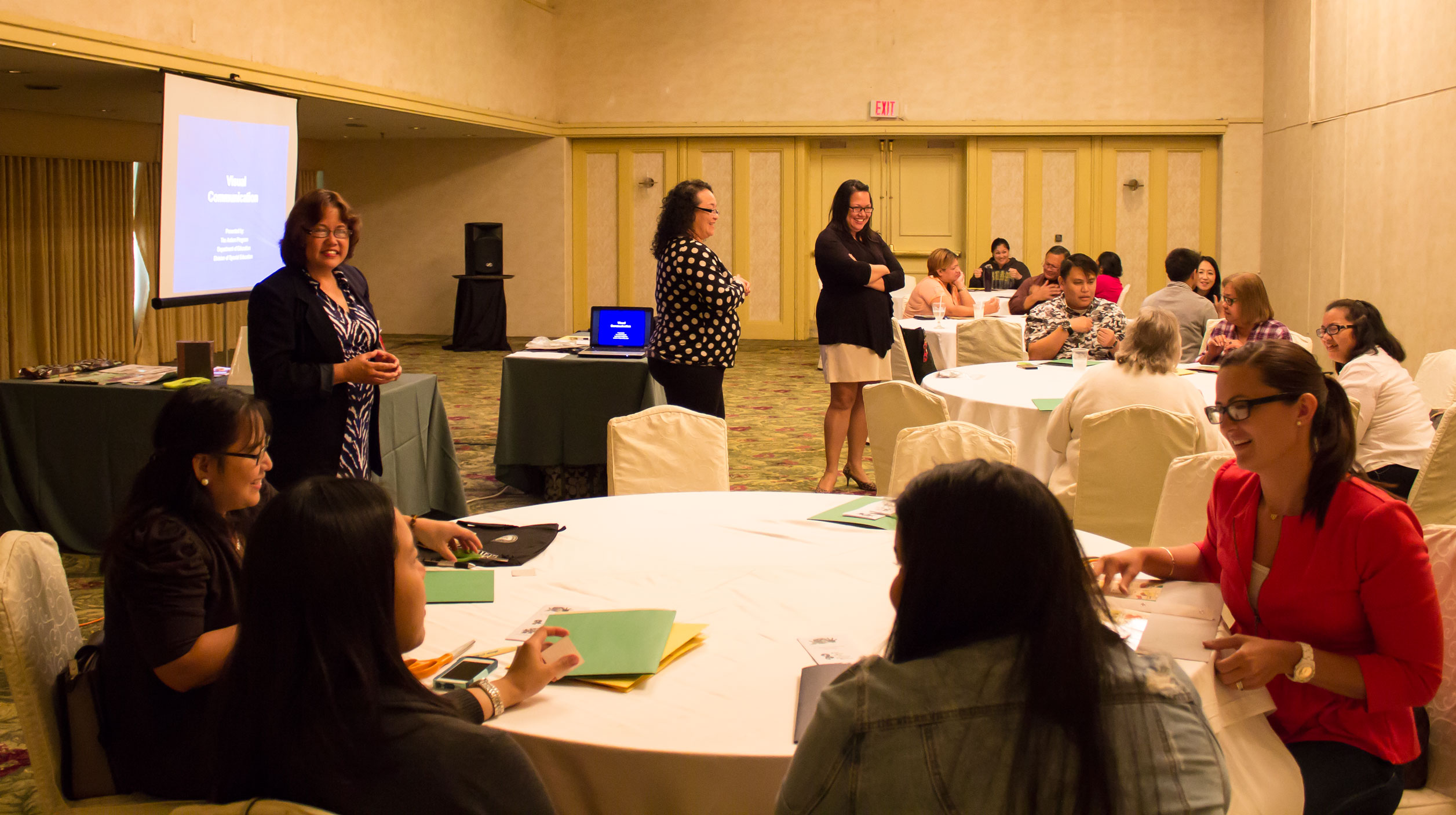 Photo of Consulting Resource Teachers-Technical Assistants for the Guam Department of Educationâ€™s Autism Program, leading a workshop.