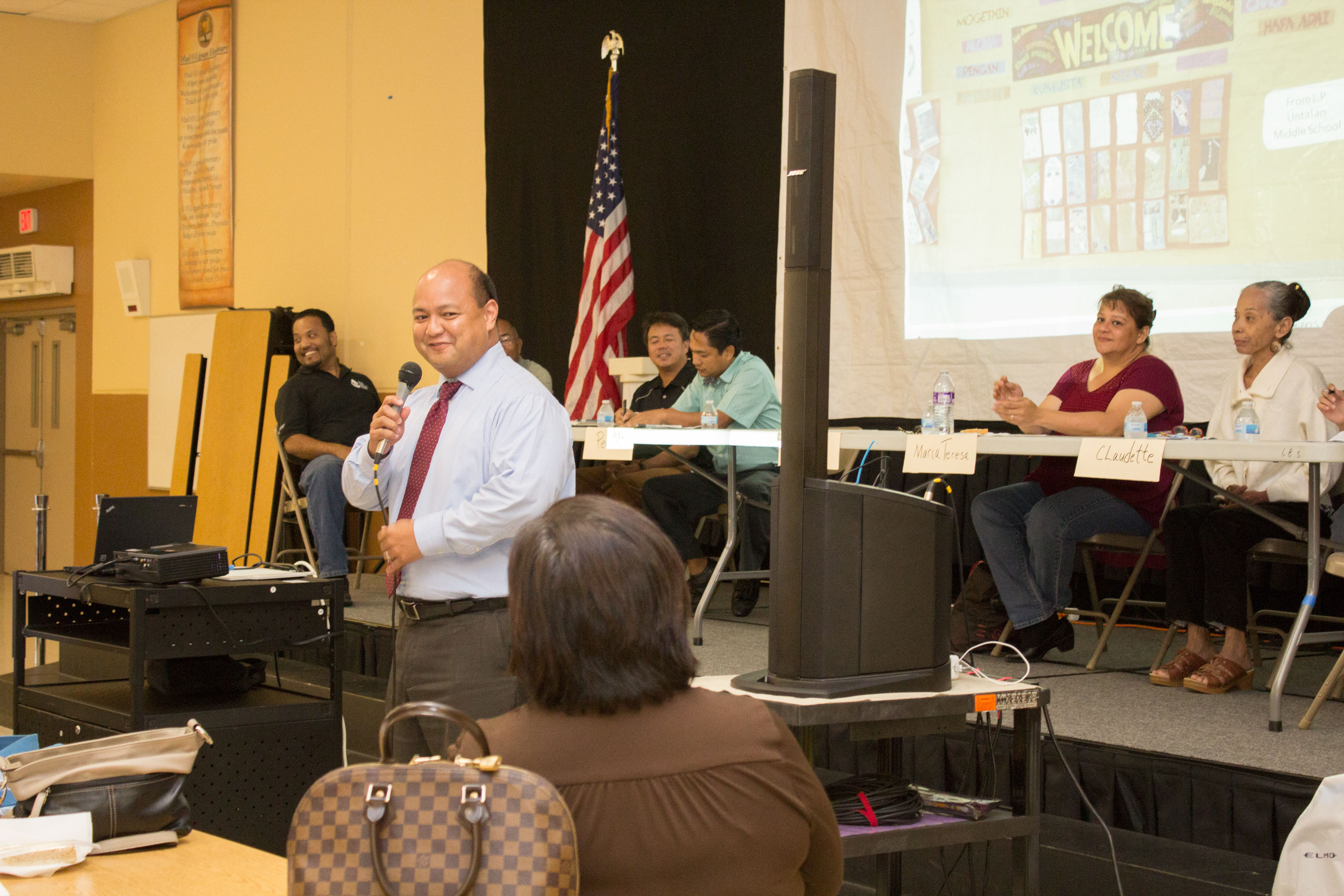 Photo of Dr. Jon Fernandez giving welcoming remarks at the REL Pacific Guam Research Alliance Parent Panel Session.