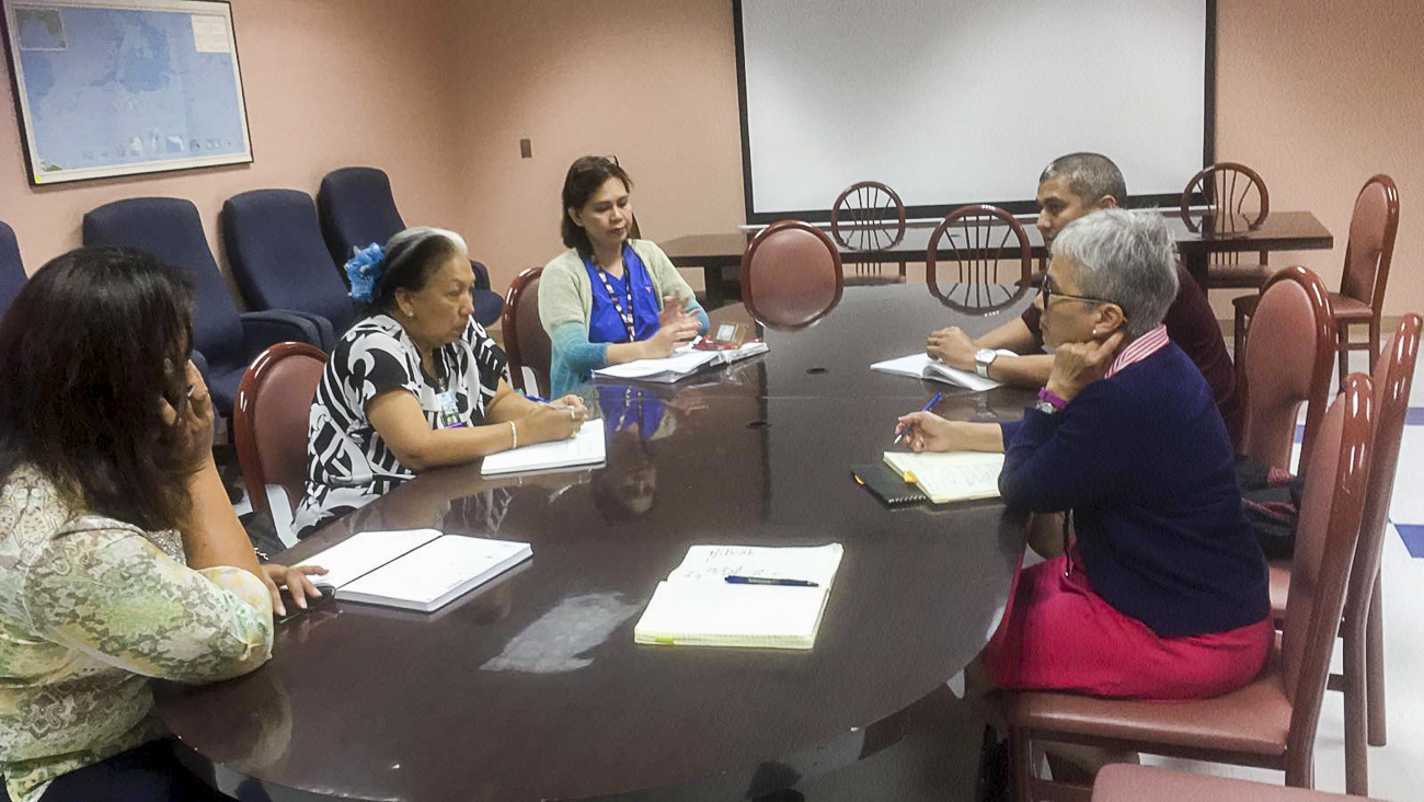 GUAM EHDI staff facilitated an Initial Screening Quality Improvement Team Meeting with representatives from the Guam Early Intervention System (GEIS) and Guam Memorial Hospital Authority (GMHA) at the GMHA Boardroom on August 25.  Modifications were made to the initial screening processing protocol during the meeting.  Participating in the meeting were (L-R): Pat Mantanona, GEIS Program Coordinator; Melinda Trealtas, RN, GEIS Nurse; Maravic Guiao, RN, GMHA OB Ward Nurse Supervisor; JJ Mendiola, Guam CEDDERS Data Interoperability Manager; and Marie Wusstig, Guam CEDDERS Training Associate.  Also attending the meeting was Terrie Fejarang, Guam CEDDERS Associate Director.